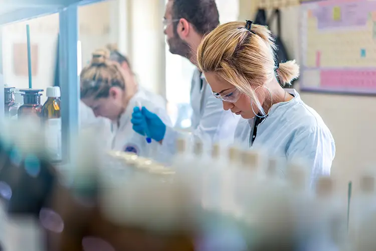 Young female scientist working in laboratory